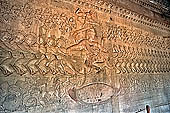 Angkor Wat temple, the bas-reliefs of the third enclosure. East Gallery Southern Part. Churning of the Ocean of Milk.